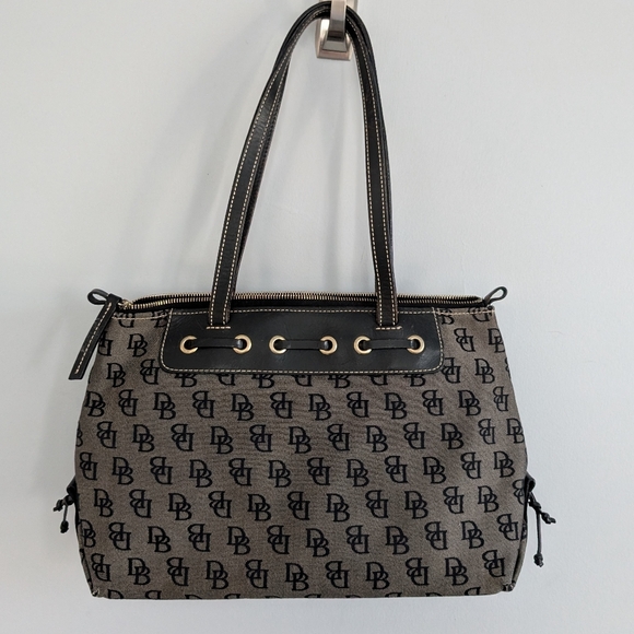 Dooney & Bourke Handbags - Dooney and Bourke Vintage Signature Monogram Tassel Purse Black